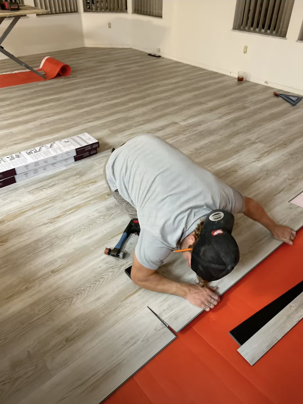 Luxury vinyl plank flooring mid-install by No Bull Man