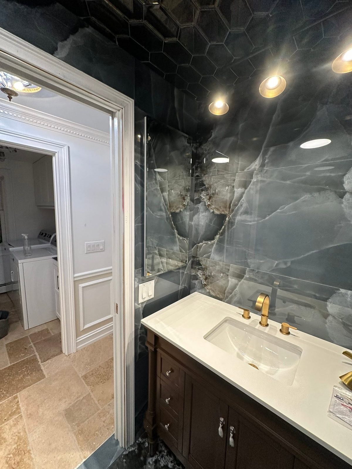 Marble bathroom with wood vanity