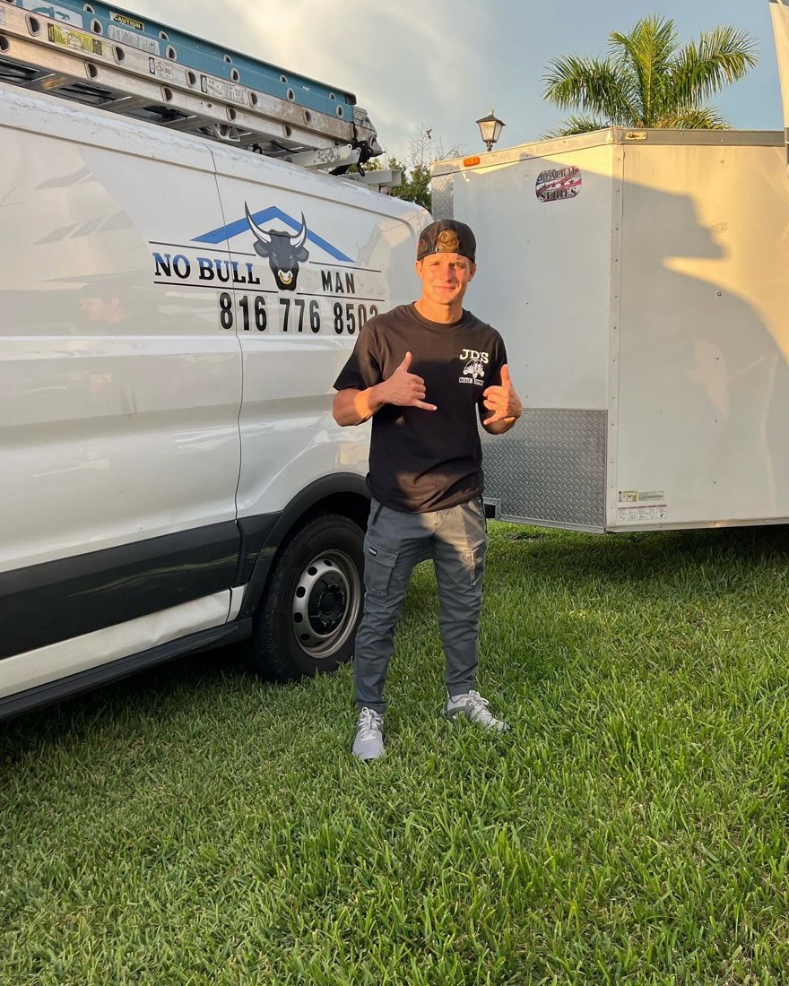Dominic Nobile, owner of NoBull Man LLC, at his work van in Southwest Florida