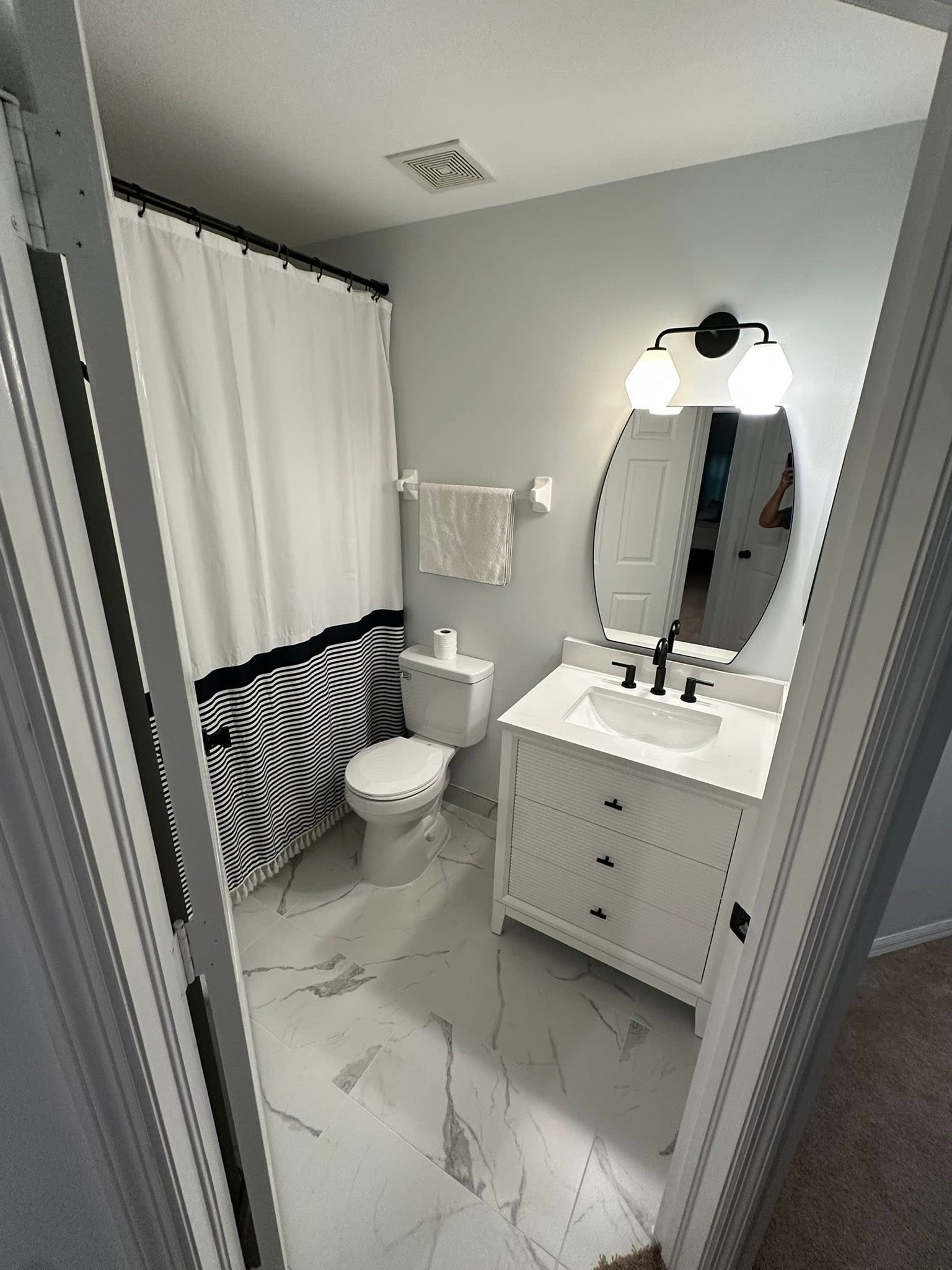 A bright guest bathroom finished by NoBull Man
